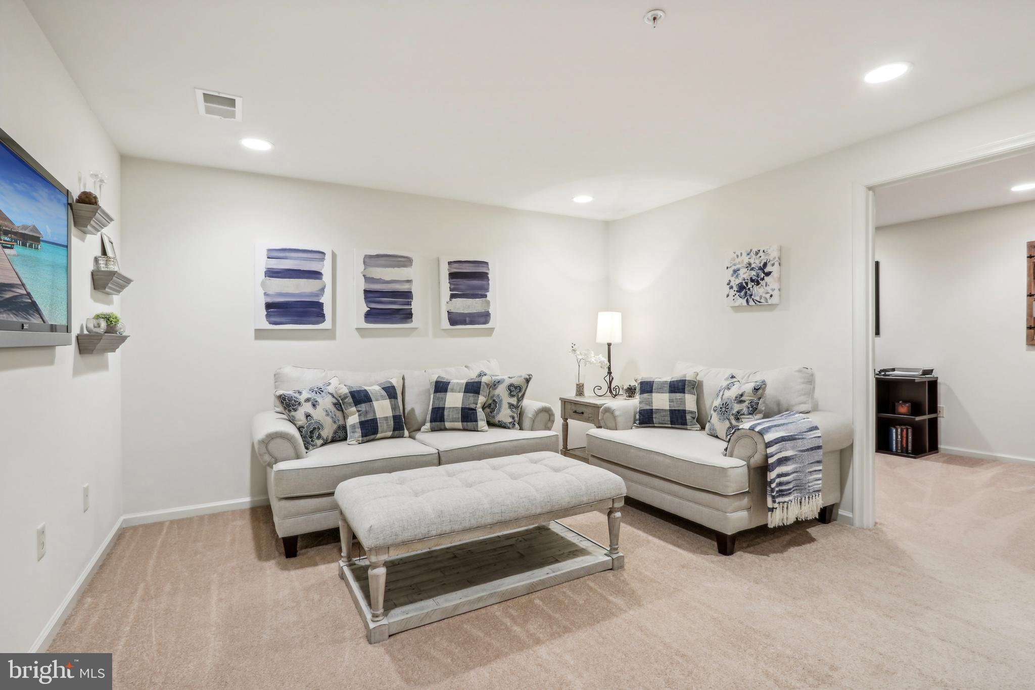 705 Ridgeview Court Sellersville, PA 18960 - Photo 7 of 21 a bedroom with furniture and a couch