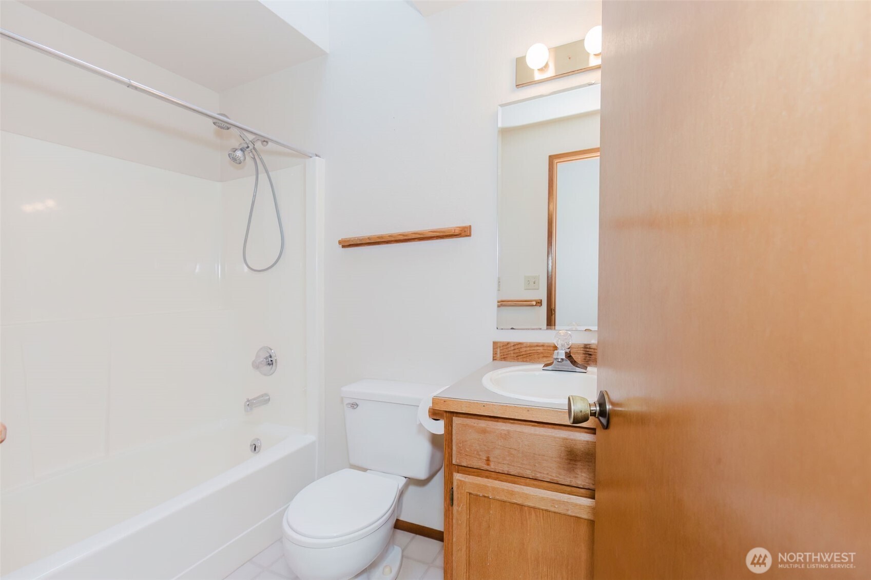 3303 Northwest Half Mile Road Silverdale, WA 98383 - Photo 13 of 33 a bathroom with a sink a toilet and shower