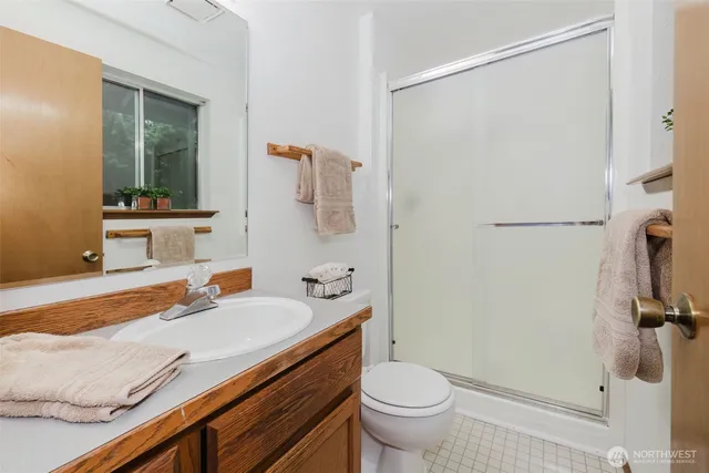 a view of backyard with a deck and wooden floor