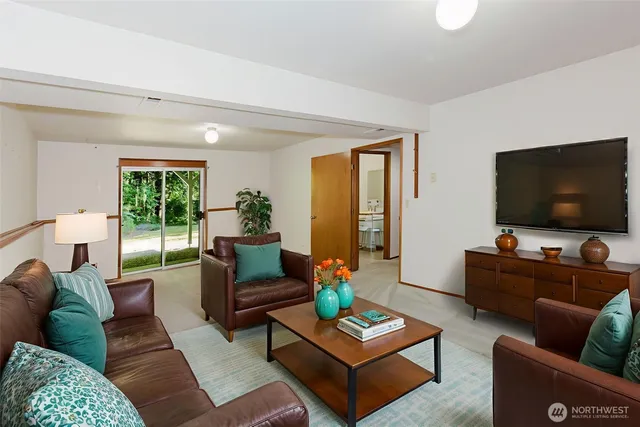 a view of a street with large trees