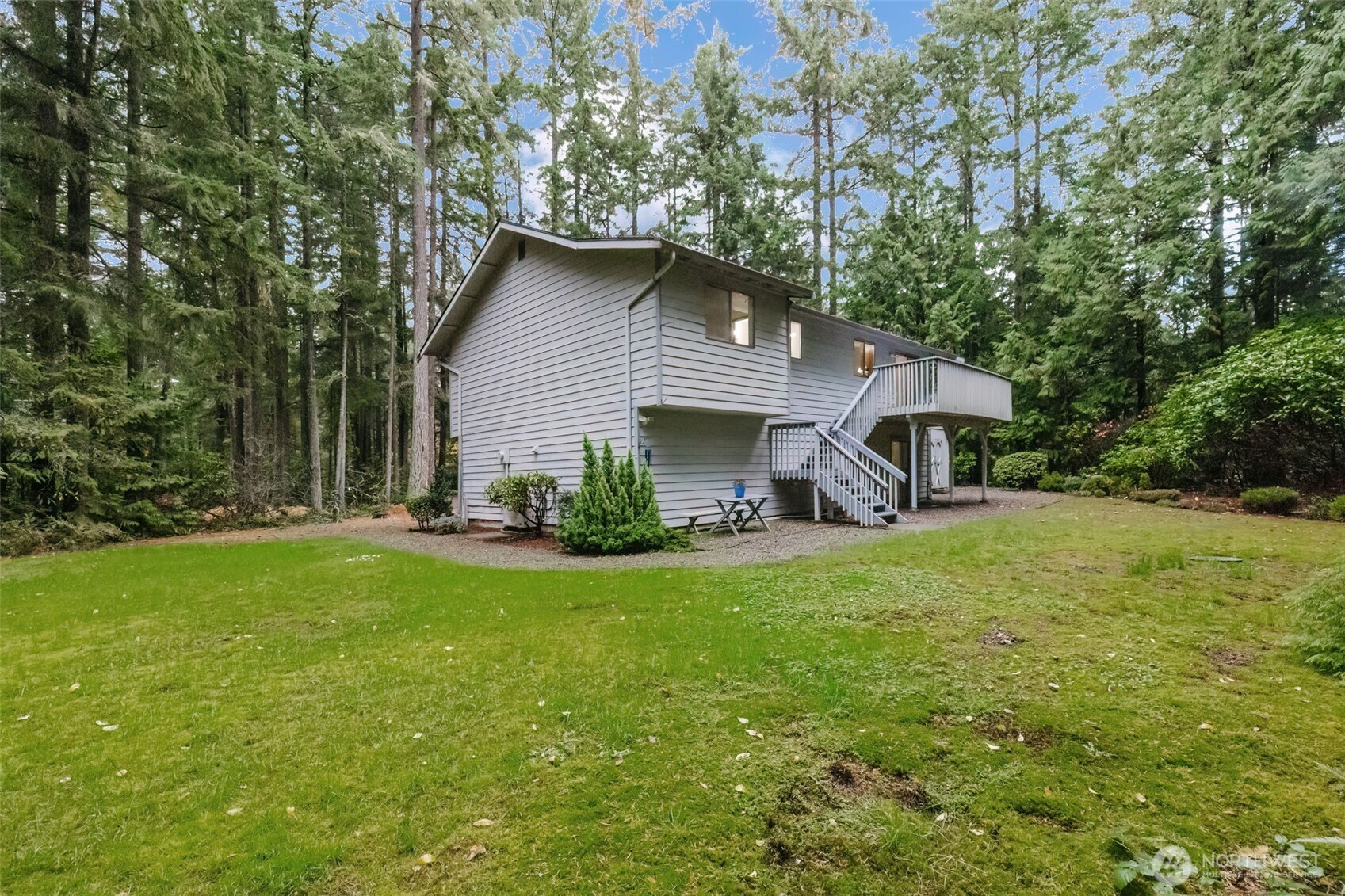3303 Northwest Half Mile Road Silverdale, WA 98383 - Photo 21 of 33 a front view of house with yard and seating area