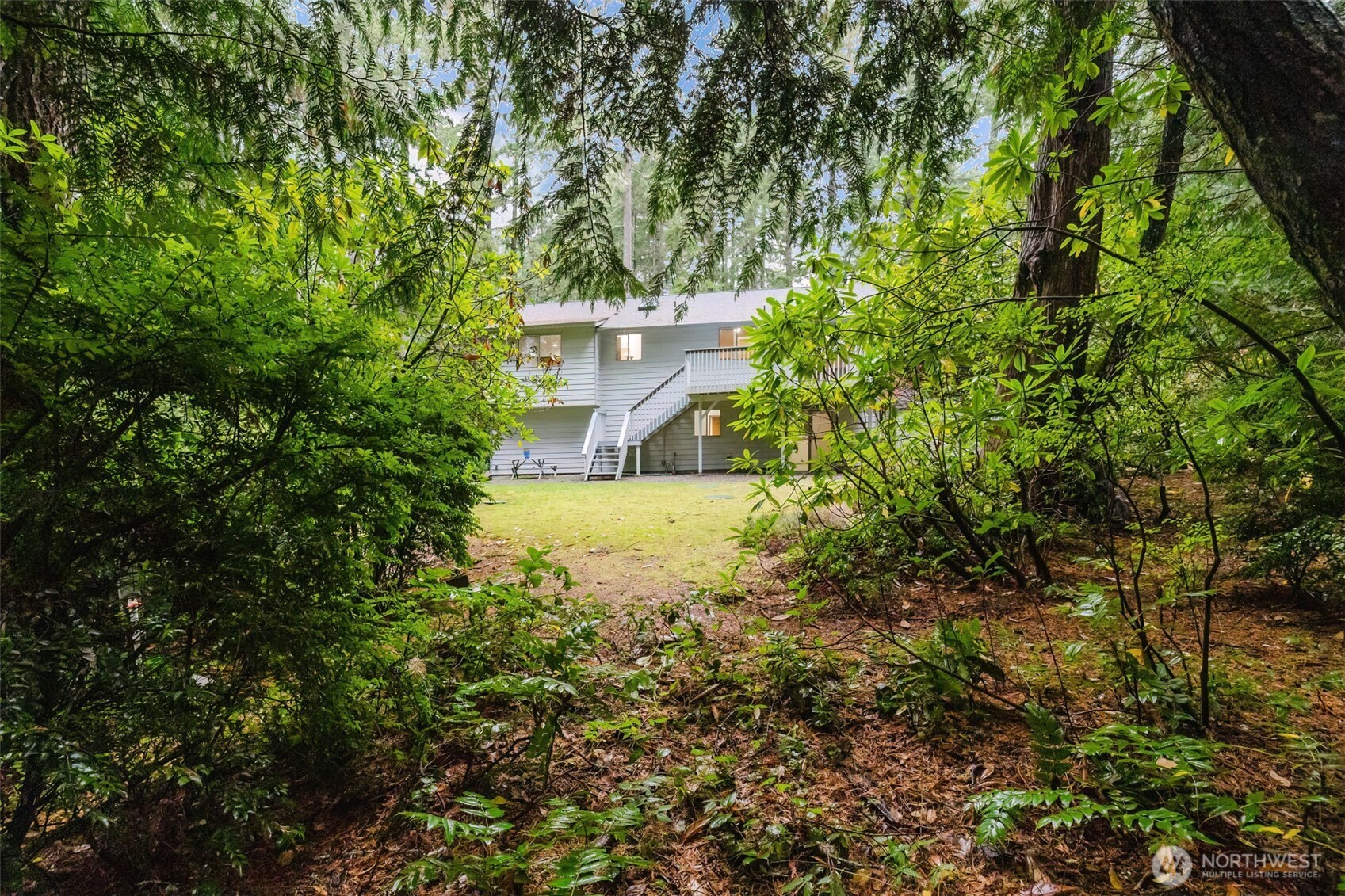 3303 Northwest Half Mile Road Silverdale, WA 98383 - Photo 27 of 33 a view of house with yard
