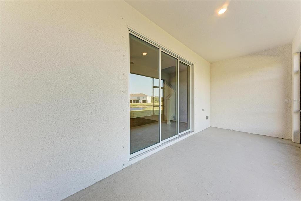 11427 Planetree Place Bradenton, FL 34211 - Photo 11 of 28 a view of an empty room with a window