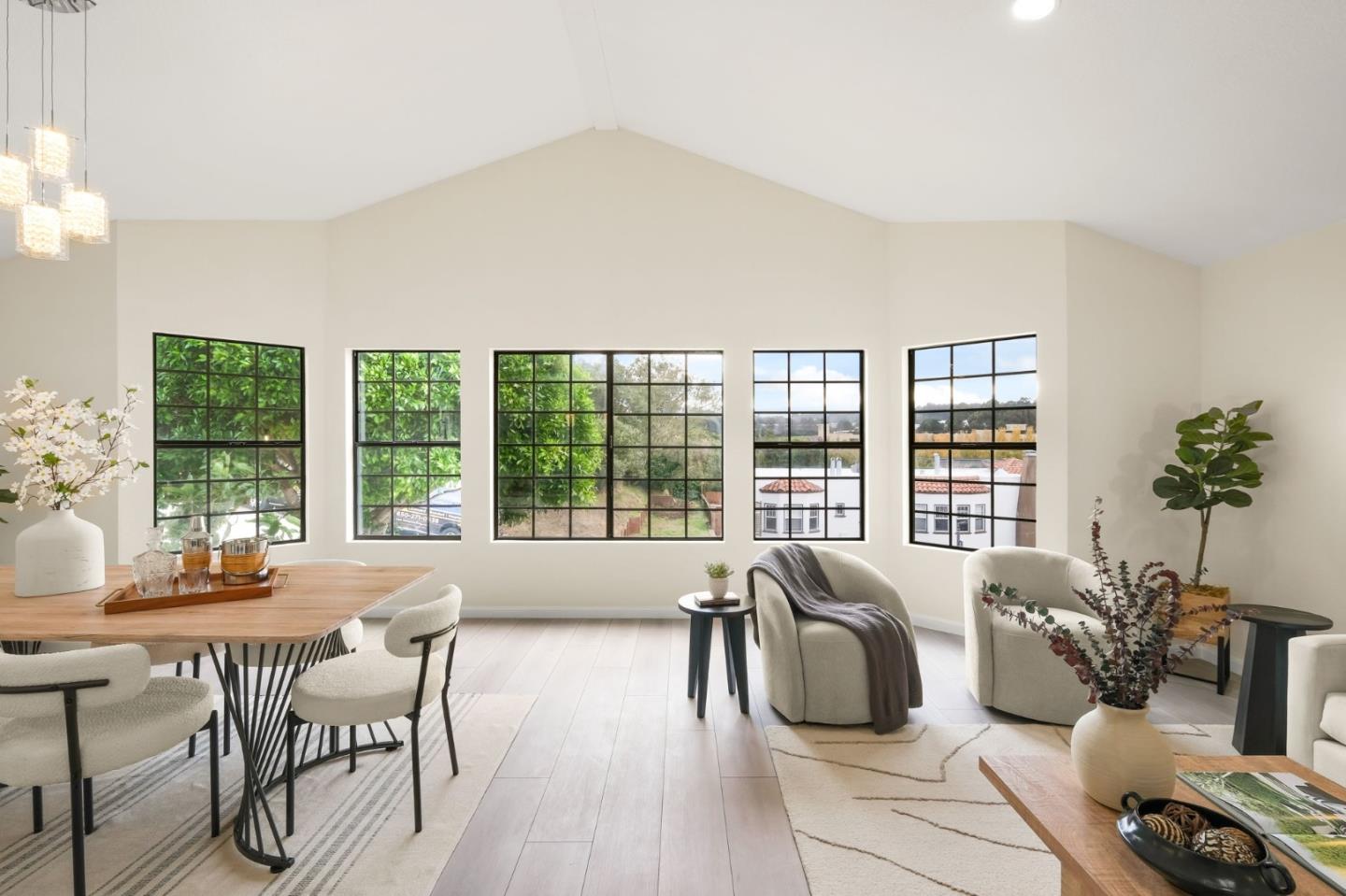 415 C Street Colma, CA 94014 - Photo 15 of 45 a living room with furniture and a large window