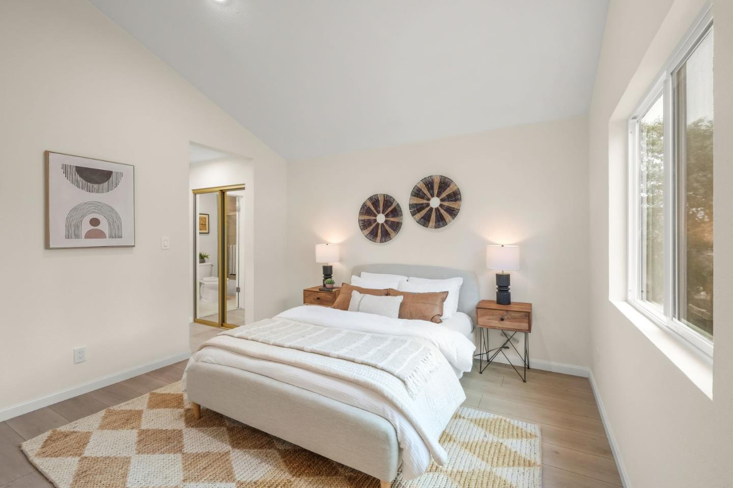 415 C Street Colma, CA 94014 - Photo 26 of 45 a bedroom with a bed and a painting on the wall