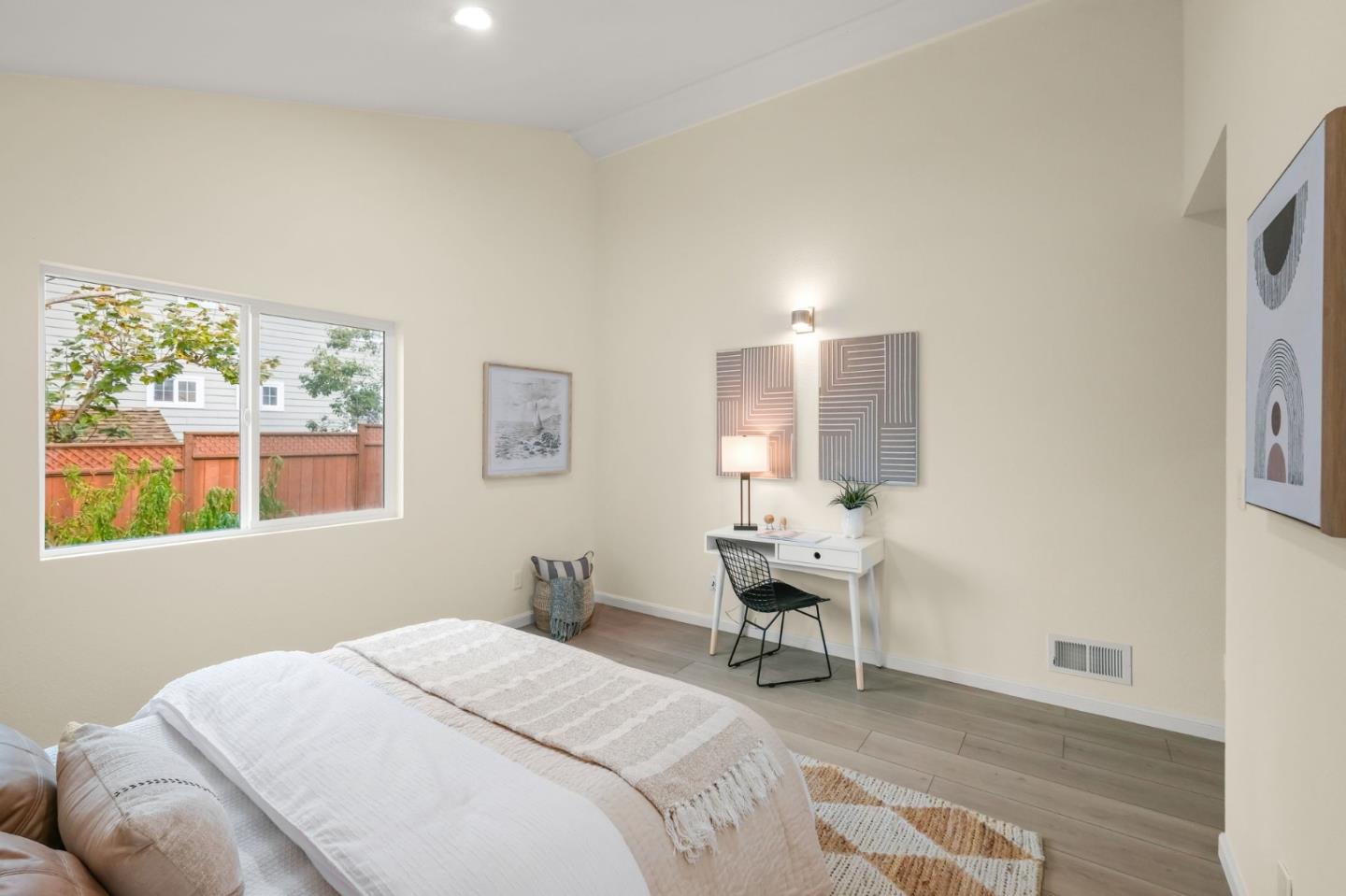 415 C Street Colma, CA 94014 - Photo 27 of 45 a bedroom with a bed and a window