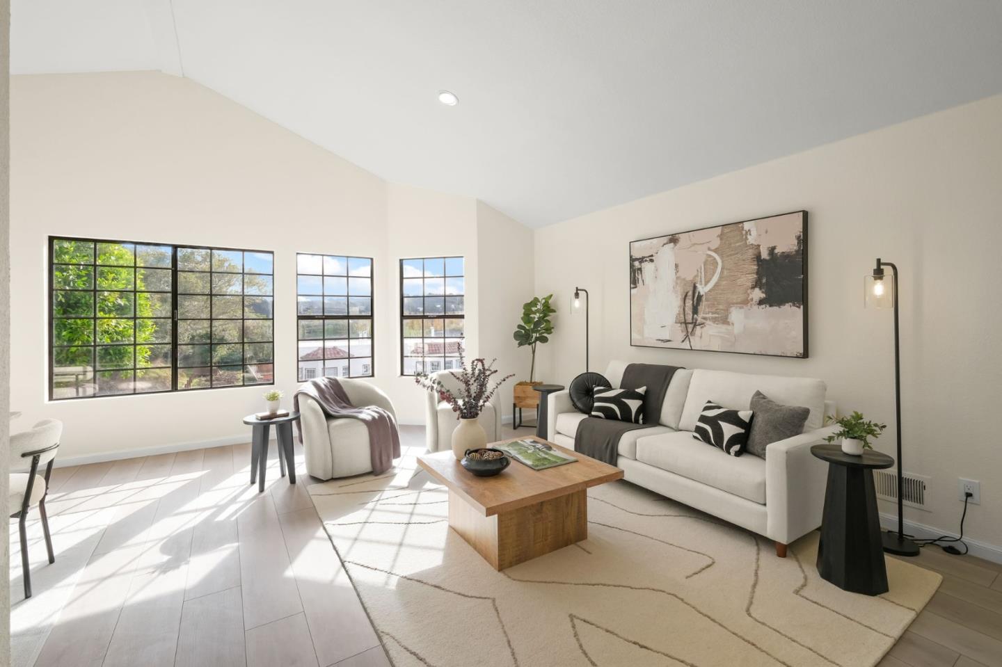 415 C Street Colma, CA 94014 - Photo 10 of 45 a living room with furniture and a large window
