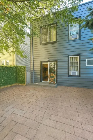 a view of backyard of a house