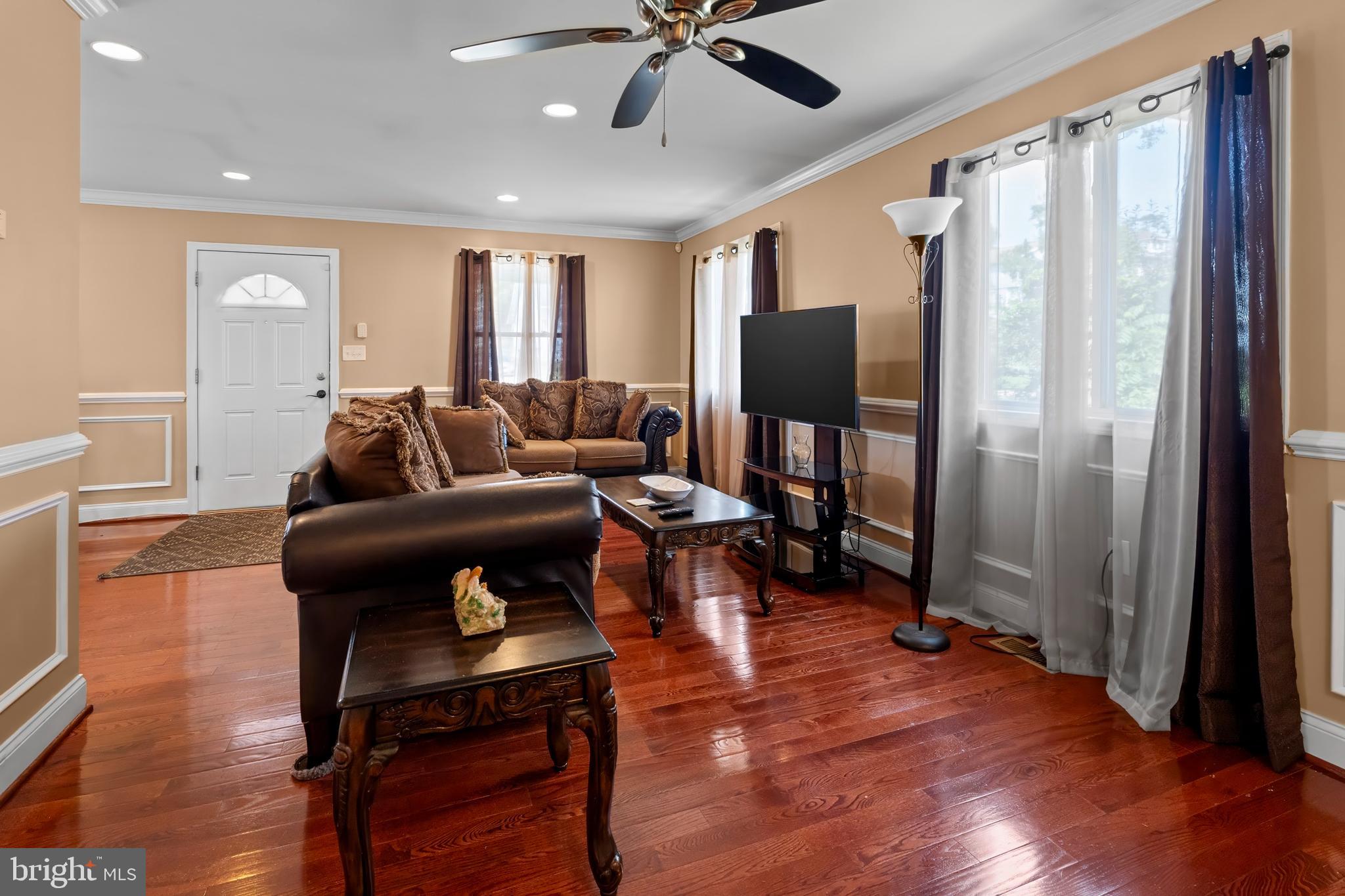 2809 Allendale Road Baltimore, MD 21216 - Photo 8 of 27 a living room with furniture and a wooden floor