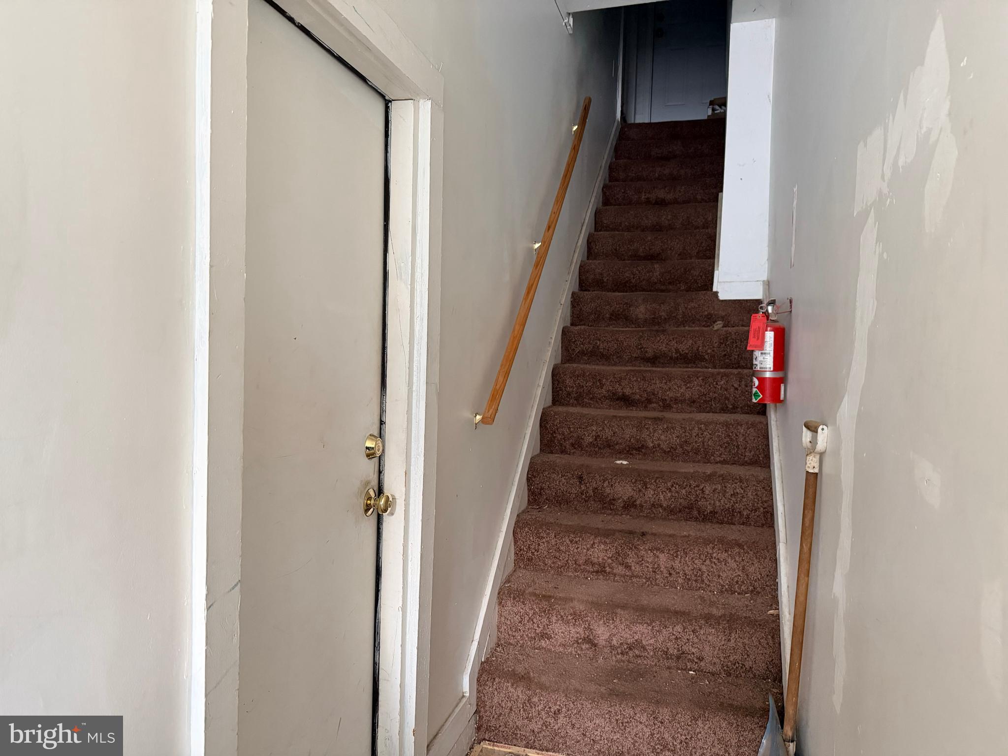 3252 Keswick Road Baltimore, MD 21211 - Photo 18 of 39 door to second floor and stairs to third