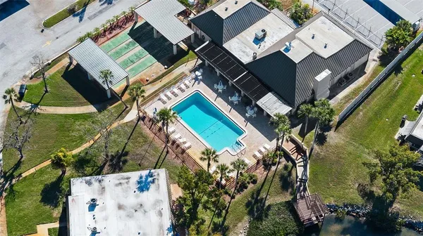 a view of a house with swimming pool