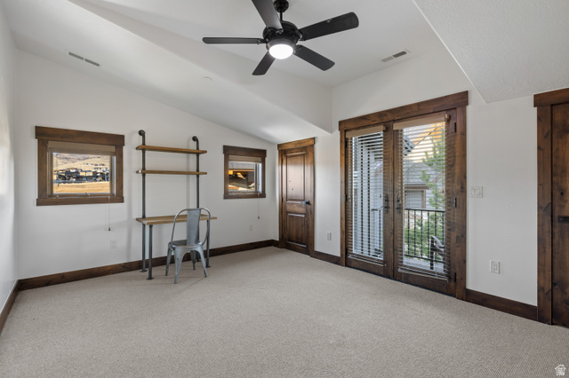 707 Chimney Rock Road, Unit 247 Heber City, UT 84032 - Photo 34 of 64 Interior space featuring light colored carpet, ceiling fan, lofted ceiling, and french doors