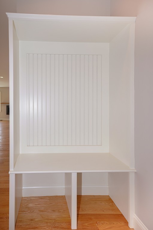 75 Decatur Street, Unit 3 Arlington, MA 02474 - Photo 11 of 20 a view of hardwood floor and cabinet