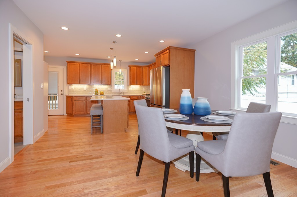 75 Decatur Street, Unit 3 Arlington, MA 02474 - Photo 7 of 20 a view of a dining room with furniture window and outside view