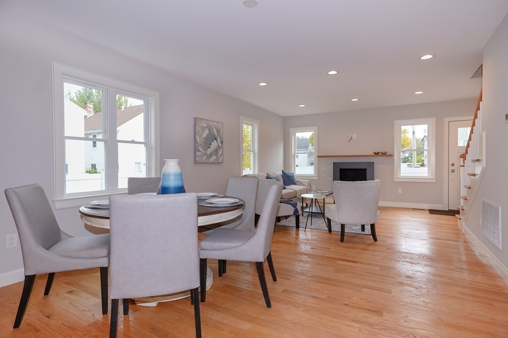 75 Decatur Street, Unit 3 Arlington, MA 02474 - Photo 8 of 20 a view of a dining room with furniture window and wooden floor
