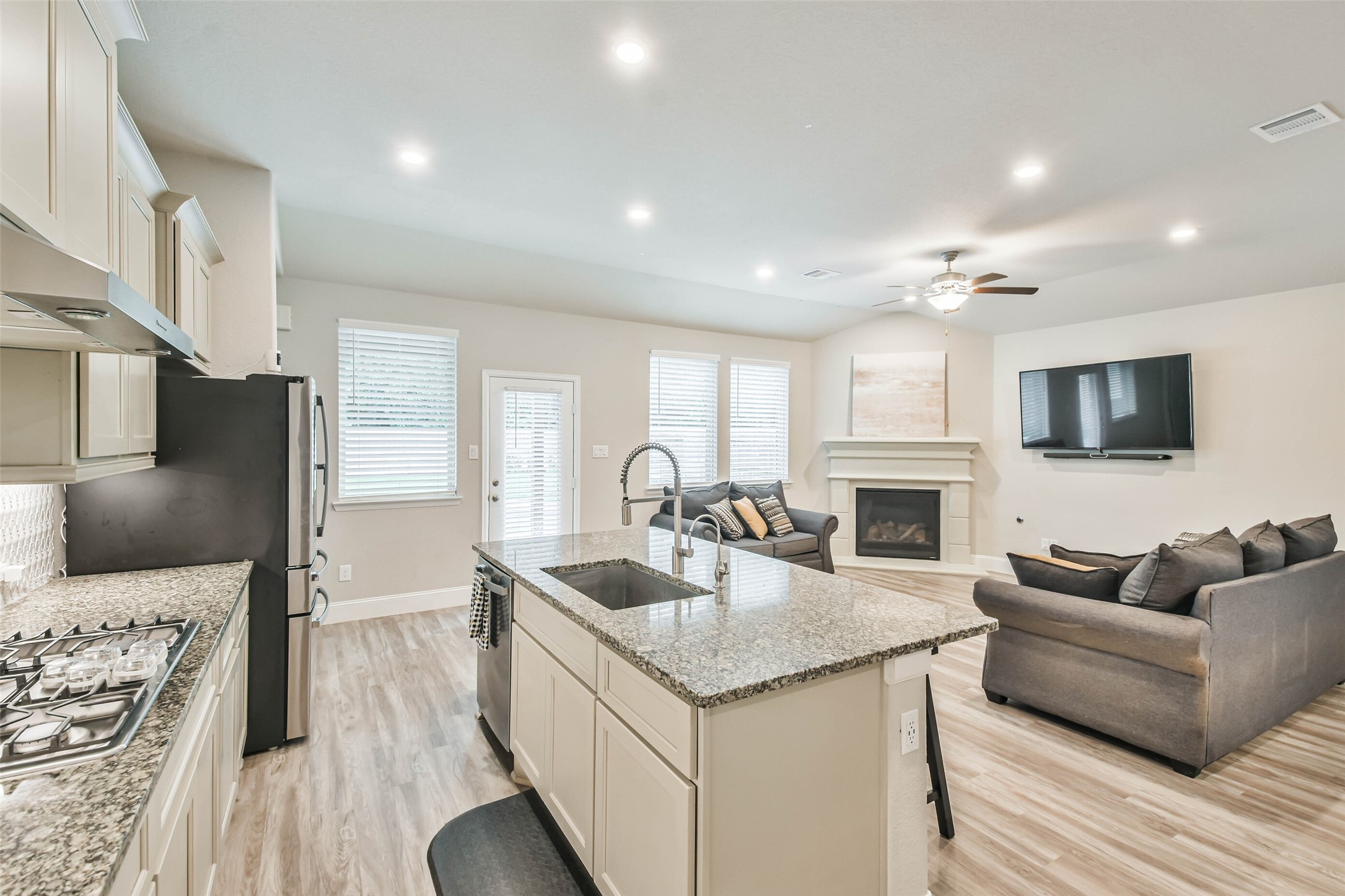 22095 Volante Drive Spring, TX 77386 - Photo 12 of 47 a living room with furniture and a fireplace