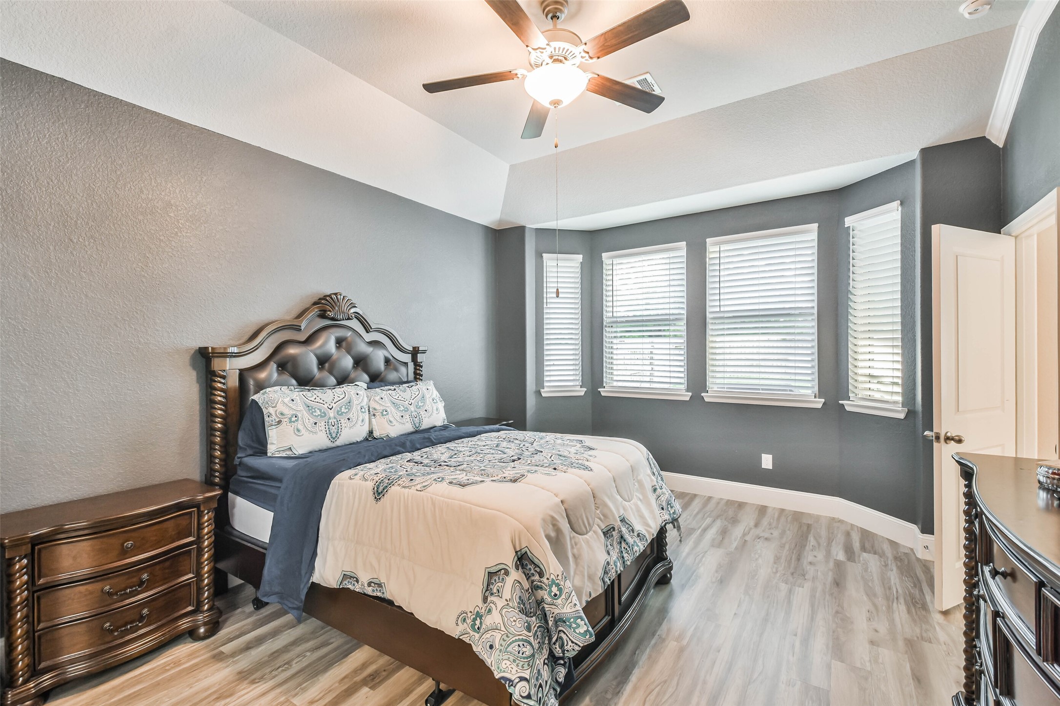 22095 Volante Drive Spring, TX 77386 - Photo 21 of 47 a bedroom with a bed and a window