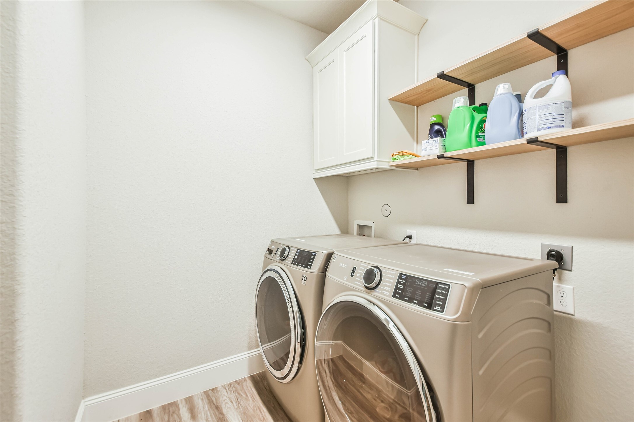 22095 Volante Drive Spring, TX 77386 - Photo 27 of 47 a utility room with dryer and washer