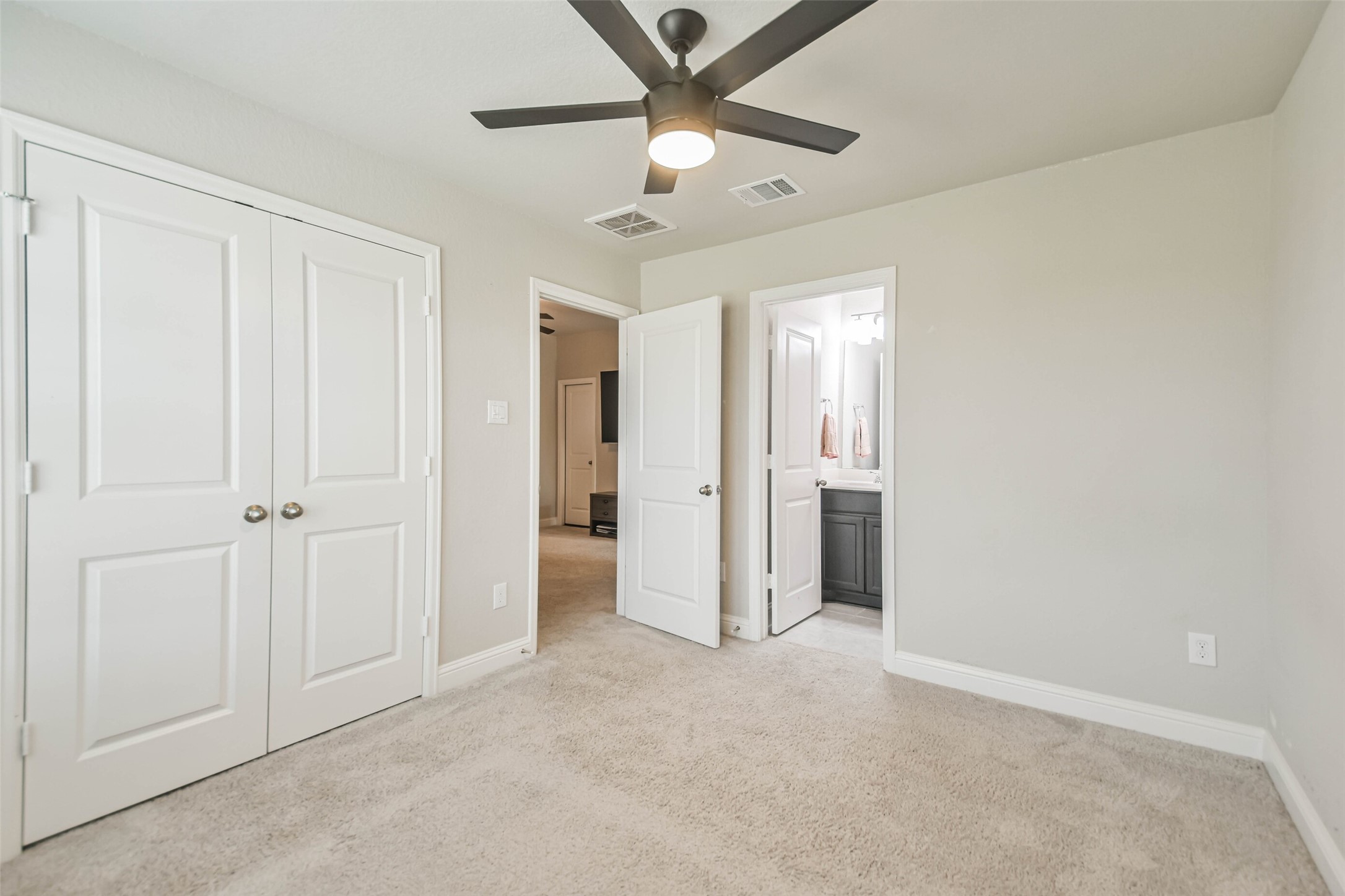 22095 Volante Drive Spring, TX 77386 - Photo 33 of 47 wooden floor in an empty room and a ceiling fan
