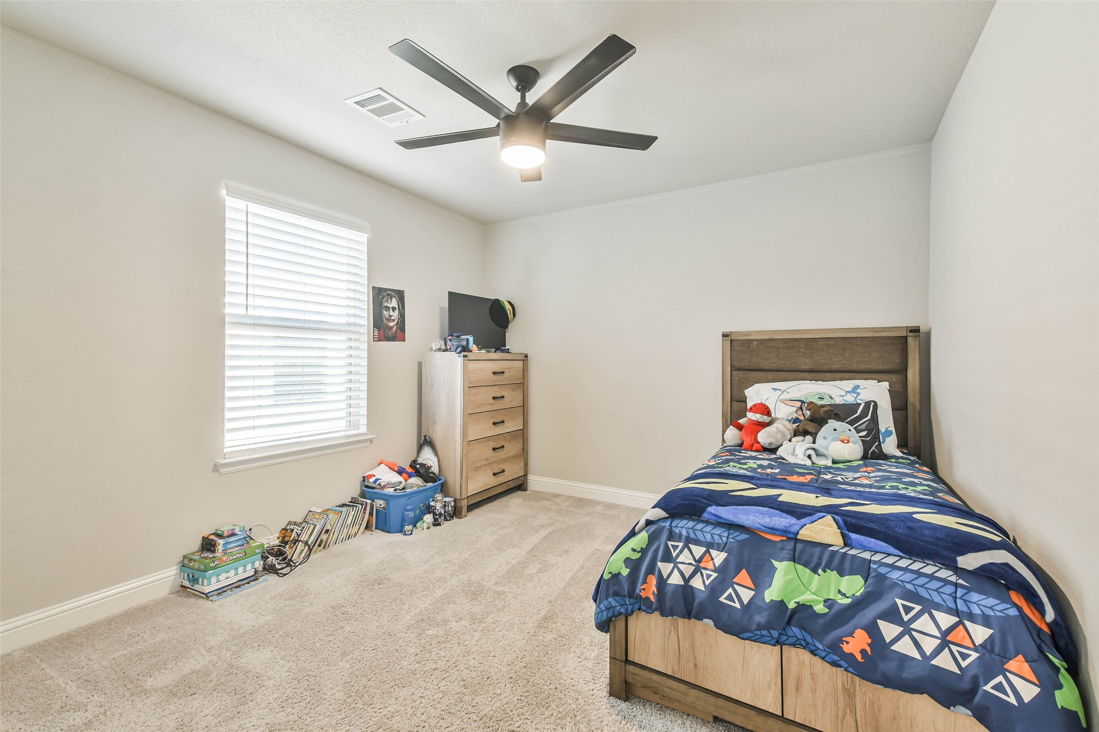 22095 Volante Drive Spring, TX 77386 - Photo 35 of 47 a bedroom with bed and window