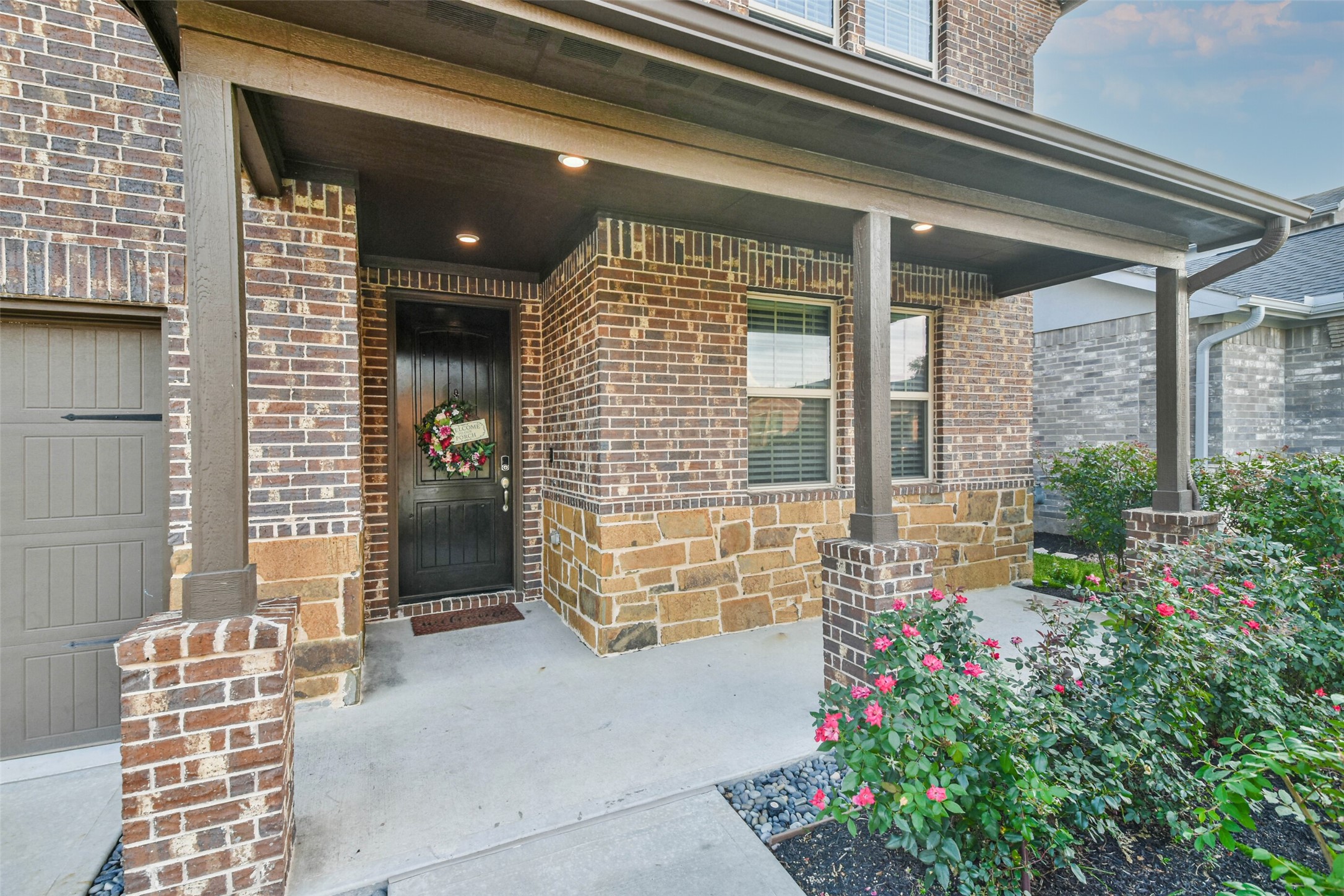 22095 Volante Drive Spring, TX 77386 - Photo 4 of 47 a potted plant sitting in front of a house