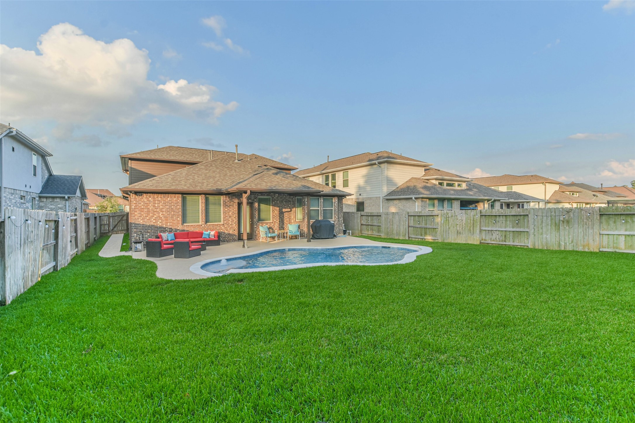 22095 Volante Drive Spring, TX 77386 - Photo 45 of 47 a view of a house with a yard and sitting area