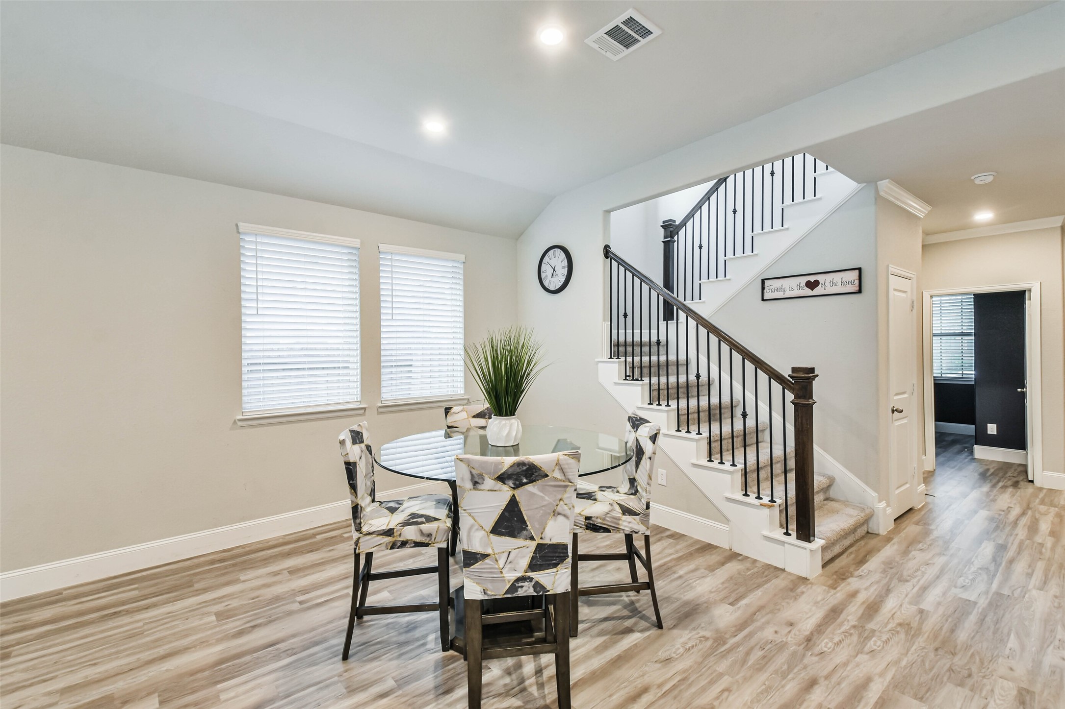 22095 Volante Drive Spring, TX 77386 - Photo 8 of 47 a view of a dining room with furniture and wooden floor