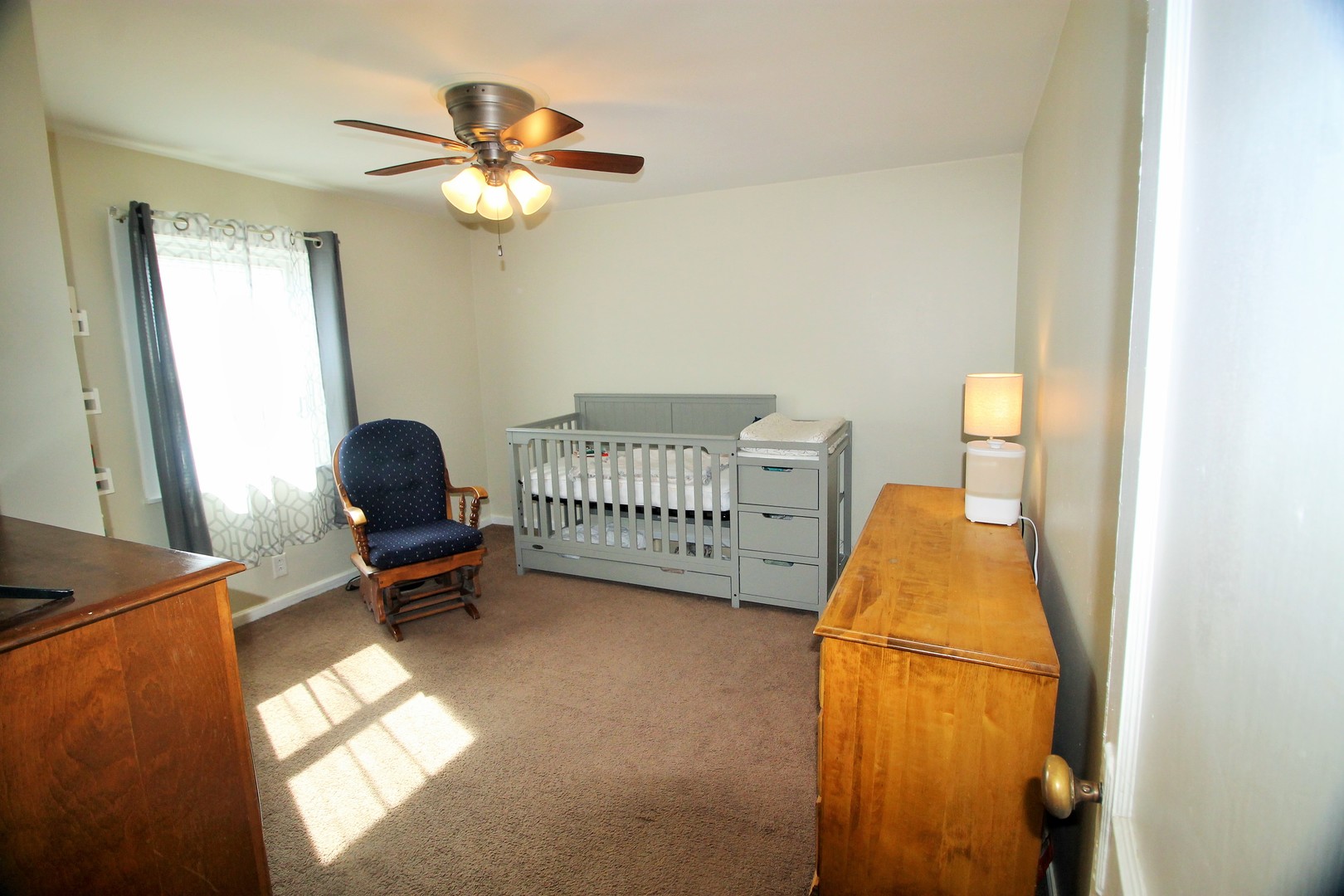817 South Illinois Street Geneseo, IL 61254 - Photo 16 of 20 a view of a workspace with furniture and a window