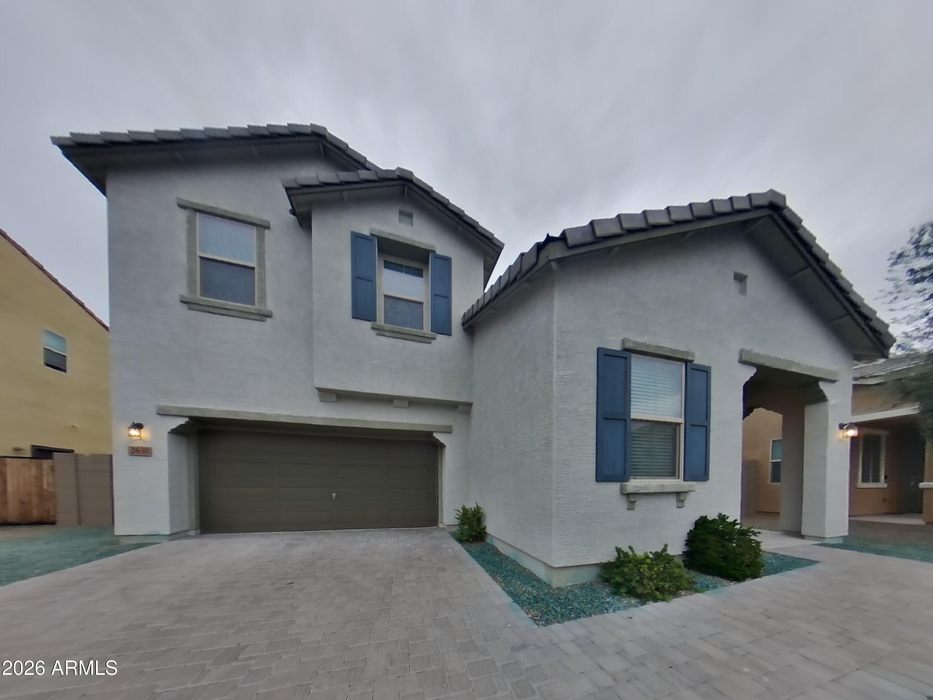 2630 East Danbury Road Phoenix, AZ 85032 - Photo 1 of 17 a house with tree in front of it