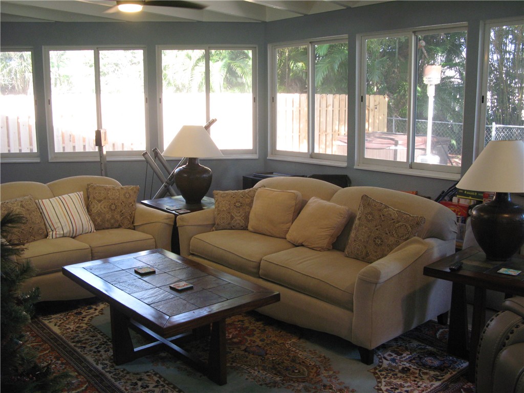 3700 Bay Street Sebastian, FL 32976 - Photo 11 of 35 a living room with furniture and a large window