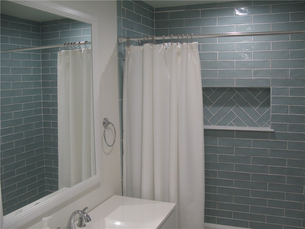 3700 Bay Street Sebastian, FL 32976 - Photo 26 of 35 a bathroom with a toilet and shower