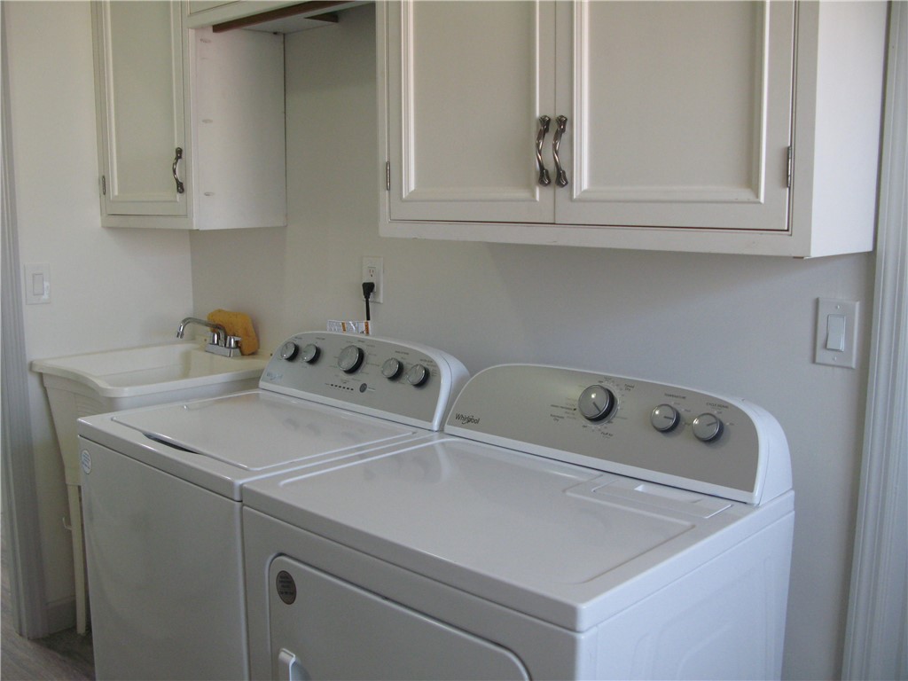 3700 Bay Street Sebastian, FL 32976 - Photo 30 of 35 a utility room with dryer and washer