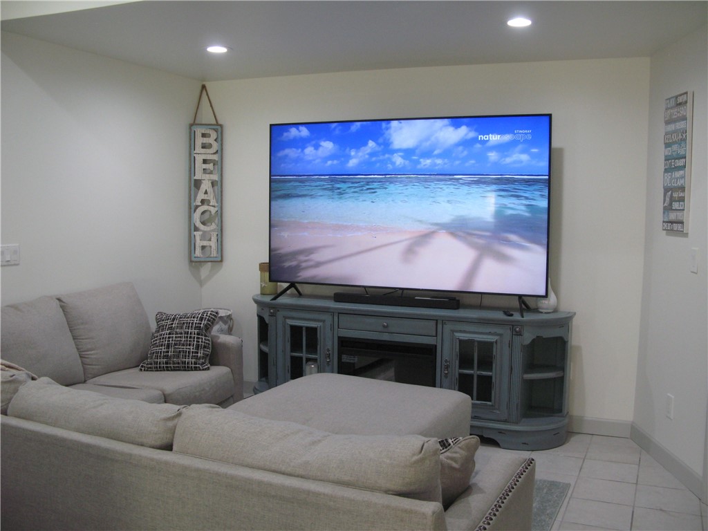 3700 Bay Street Sebastian, FL 32976 - Photo 6 of 35 a living room with furniture and a flat screen tv
