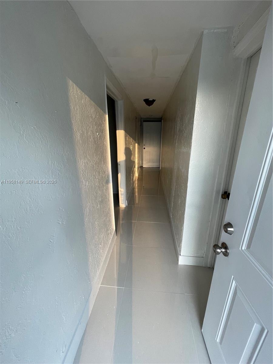 7675 Northwest 16th Avenue, Unit 7675 Miami, FL 33147 - Photo 4 of 6