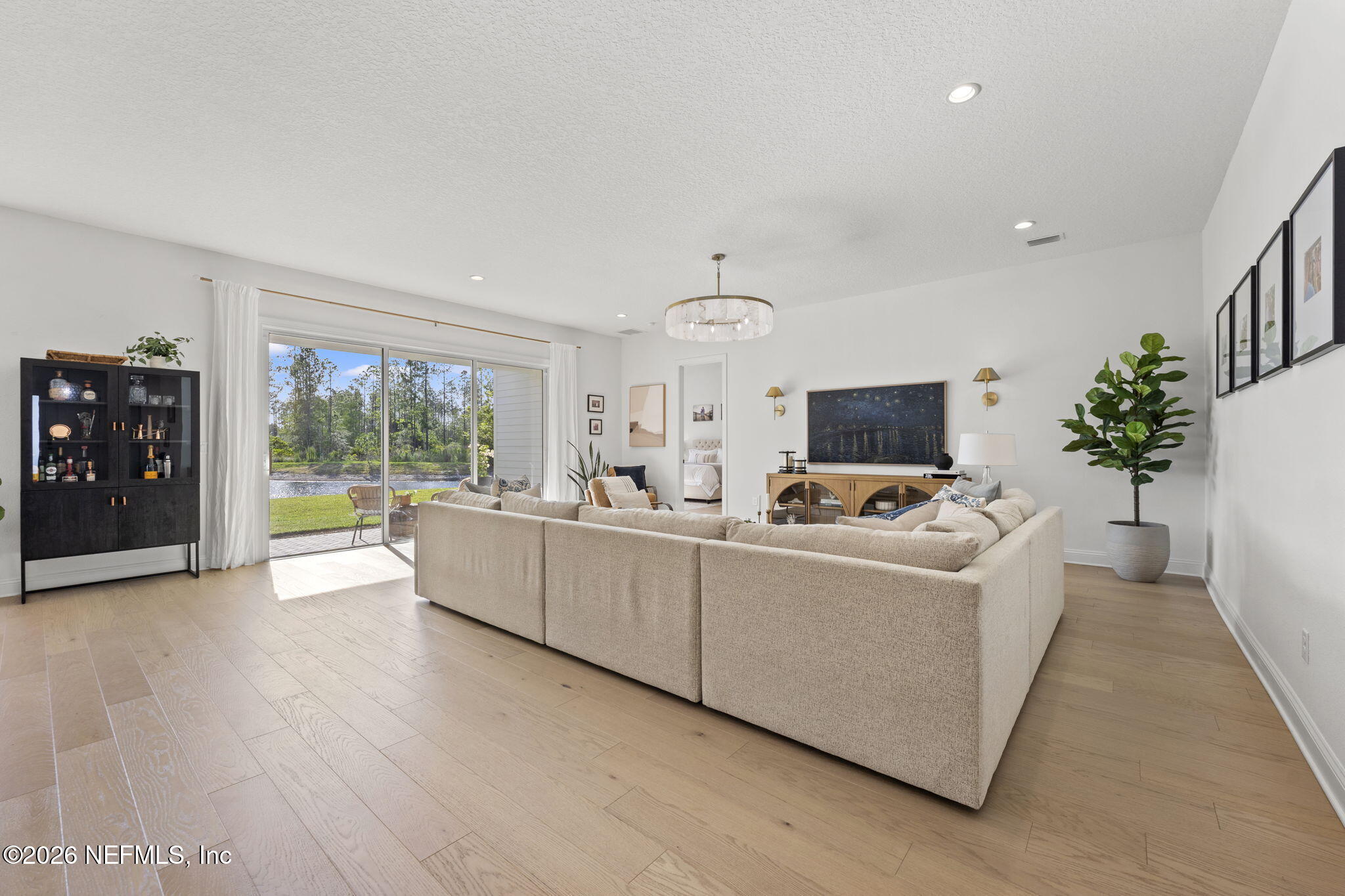 101 Elm Br Road St. Johns, FL 32259 - Photo 22 of 77 a living room with furniture and a flat screen tv