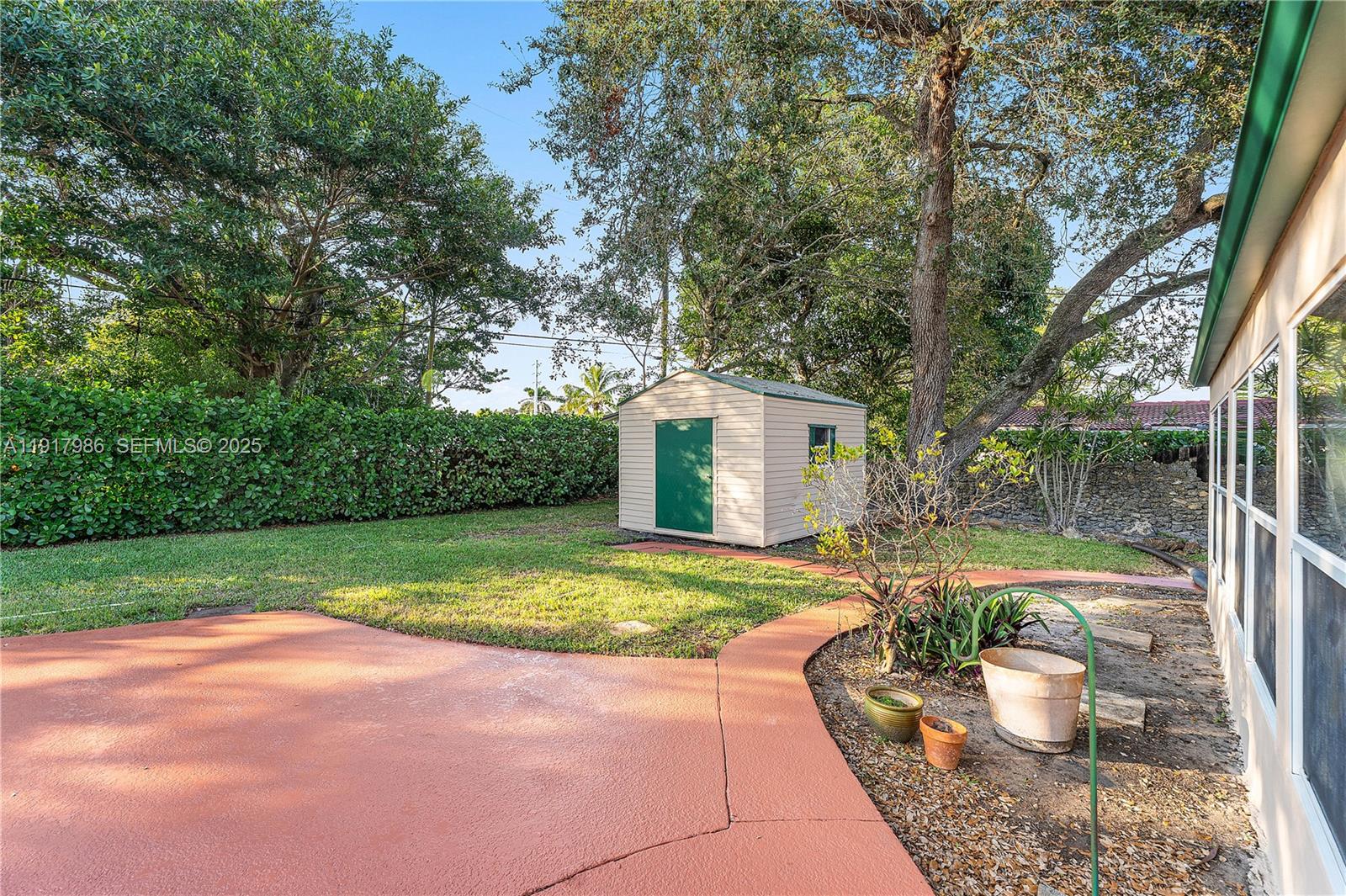475 Northwest 46th Terrace Plantation, FL 33317 - Photo 28 of 43 a view of a house with backyard and sitting area