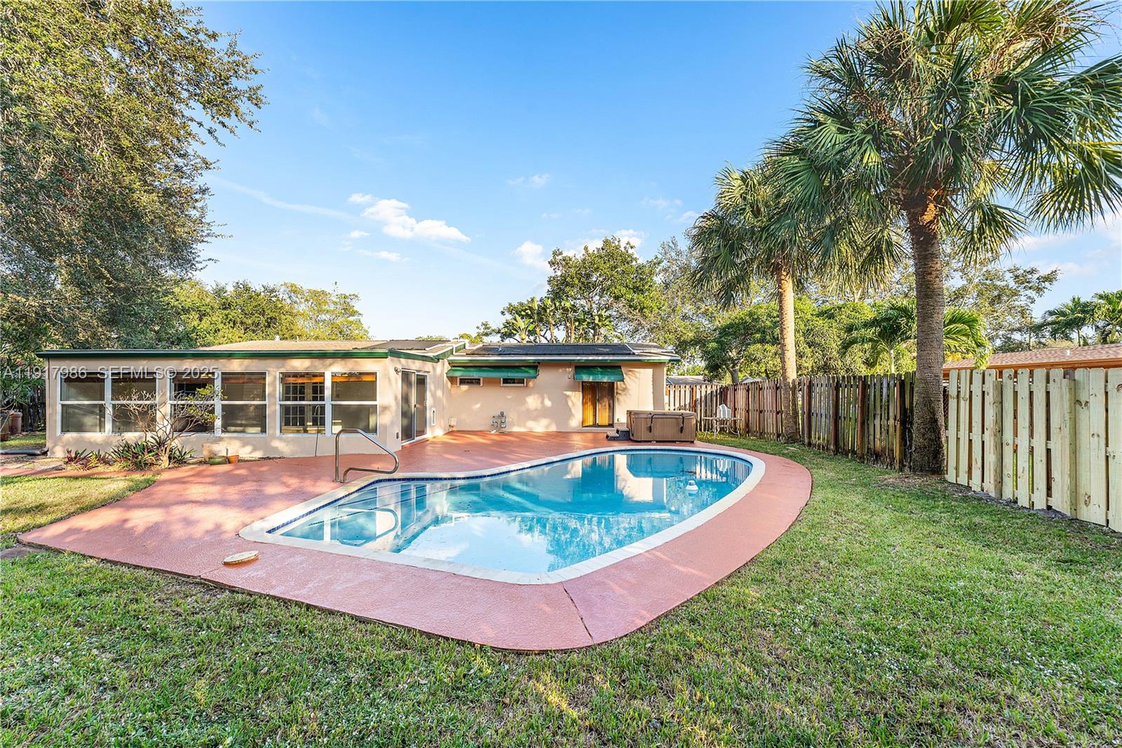 475 Northwest 46th Terrace Plantation, FL 33317 - Photo 30 of 43 a view of a house with swimming pool and porch