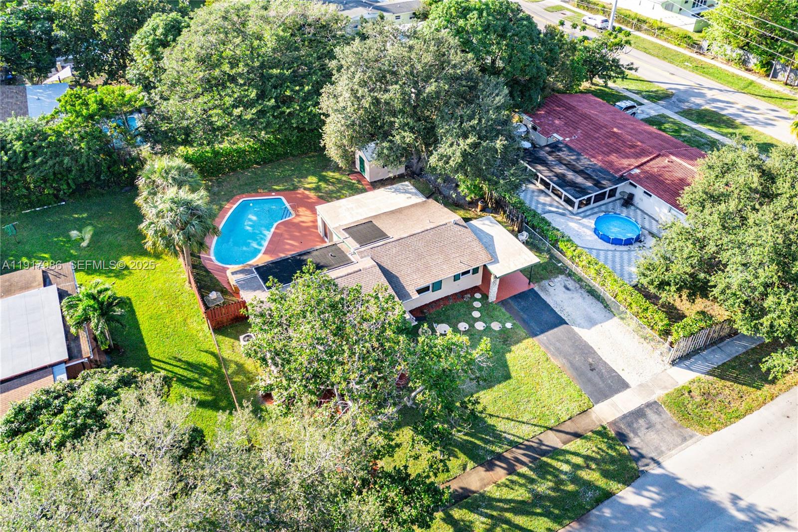 475 Northwest 46th Terrace Plantation, FL 33317 - Photo 37 of 43 an aerial view of a house with a garden