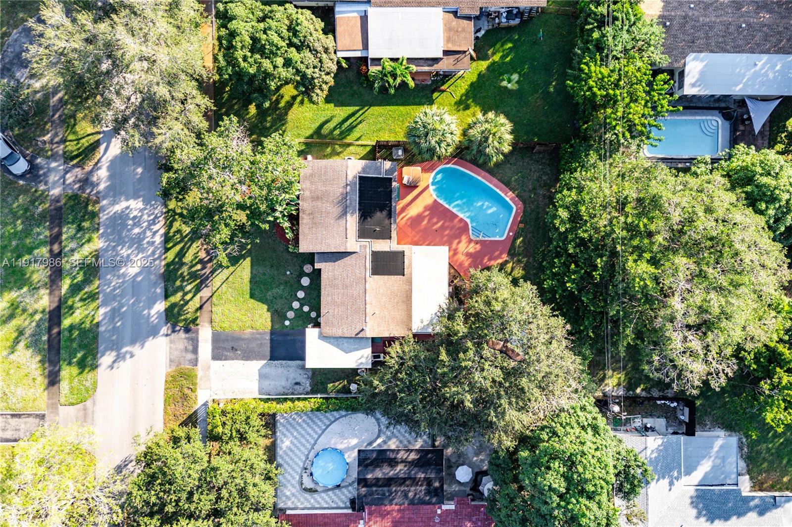 475 Northwest 46th Terrace Plantation, FL 33317 - Photo 40 of 43 an aerial view of a house with a yard and garden