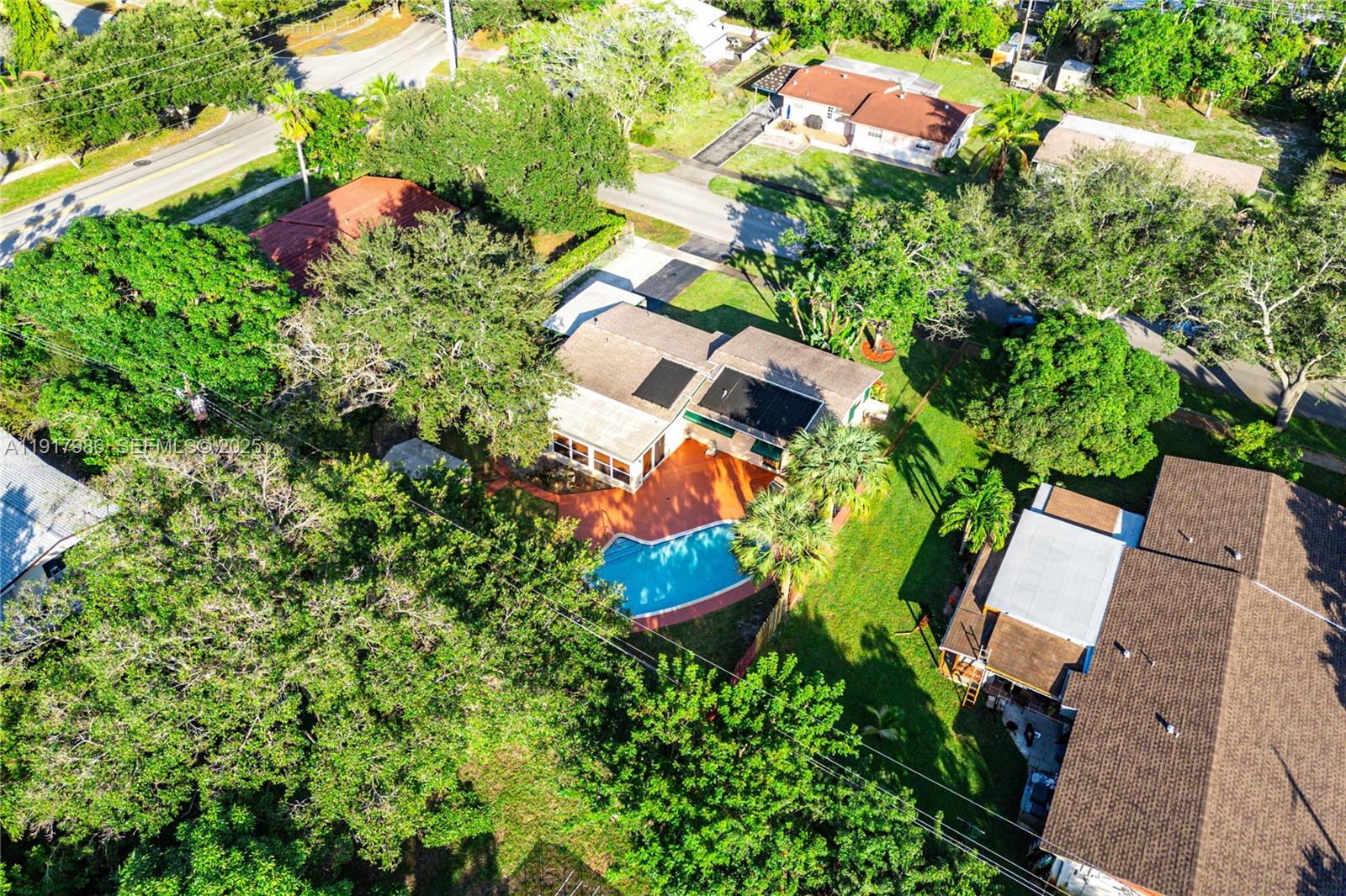 475 Northwest 46th Terrace Plantation, FL 33317 - Photo 41 of 43 an aerial view of a house with a yard and outdoor seating