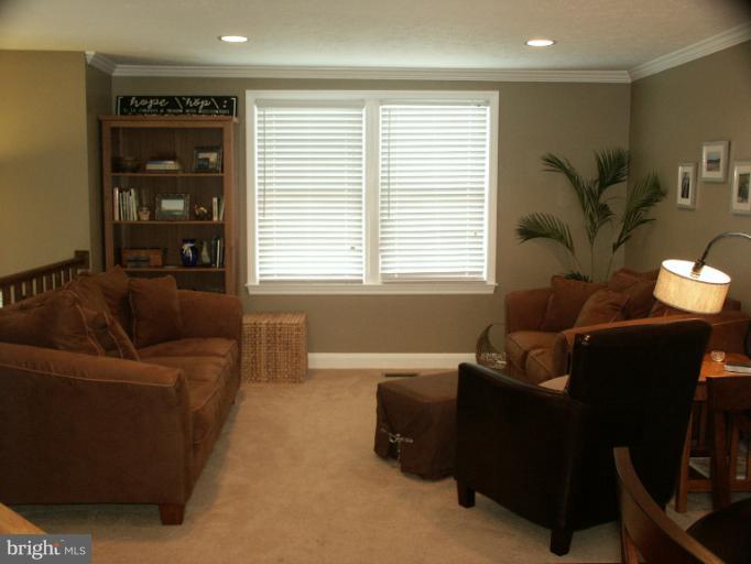 61 Yew Road Baltimore, MD 21221 - Photo 20 of 30 a living room with furniture and a window