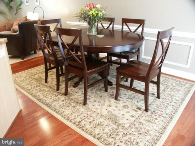 61 Yew Road Baltimore, MD 21221 - Photo 25 of 30 a view of a dining room with furniture