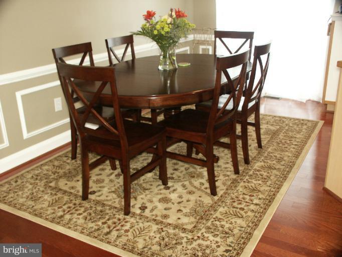 61 Yew Road Baltimore, MD 21221 - Photo 28 of 30 a view of a dining room with furniture