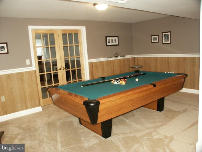 61 Yew Road Baltimore, MD 21221 - Photo 10 of 30 a room with pool table and windows