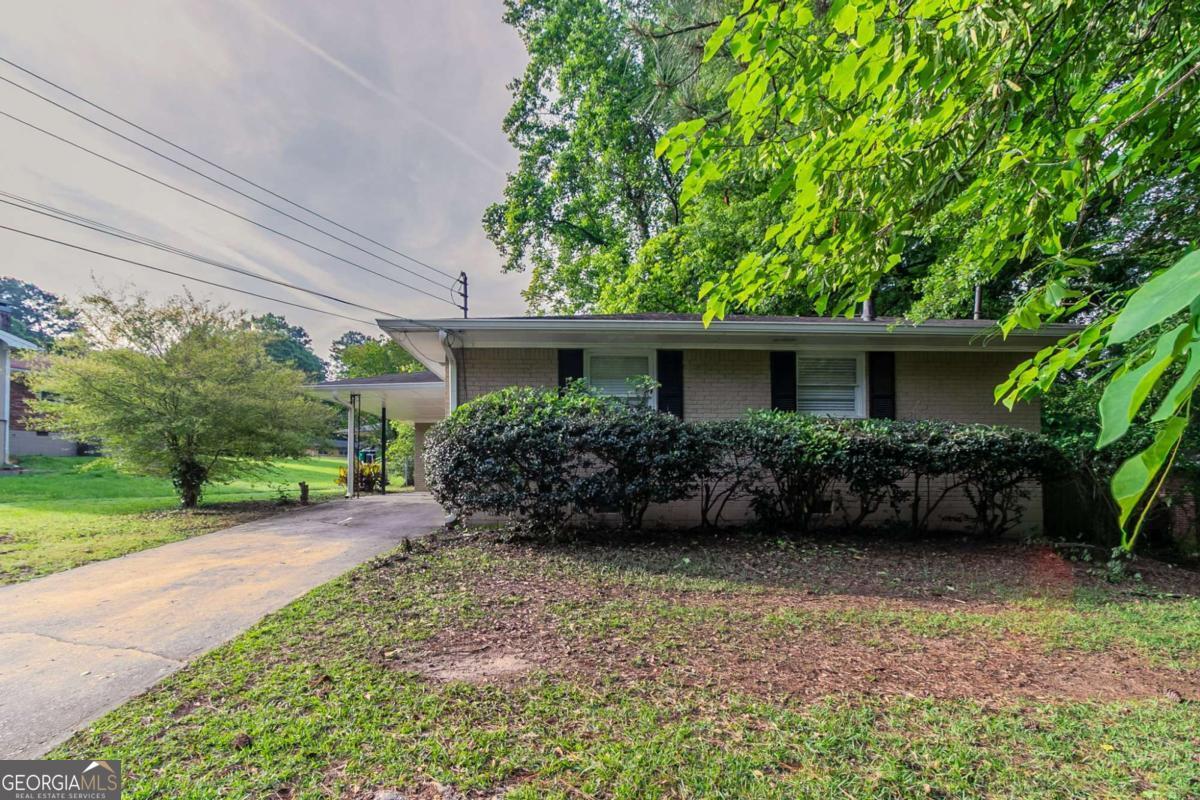 4029 Moffat Court Decatur, GA 30035 - Photo 1 of 1 a view of a house with backyard and garden