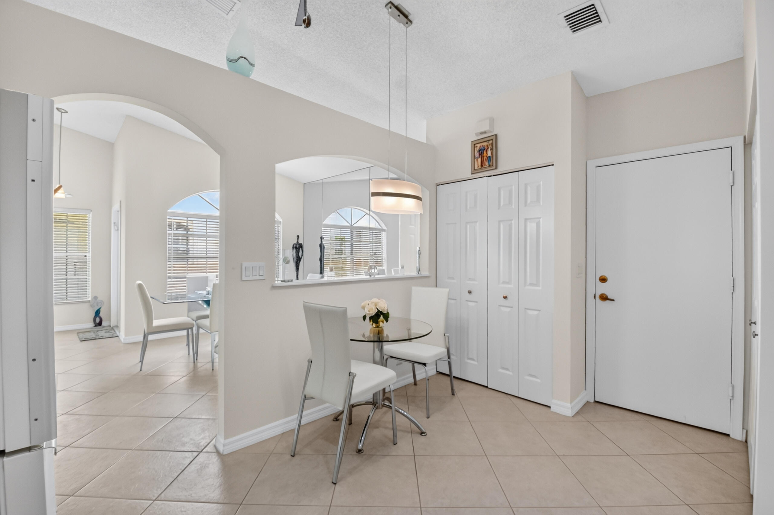 15340 Floral Club Road Delray Beach, FL 33484 - Photo 11 of 42 a view of a livingroom with furniture and a window
