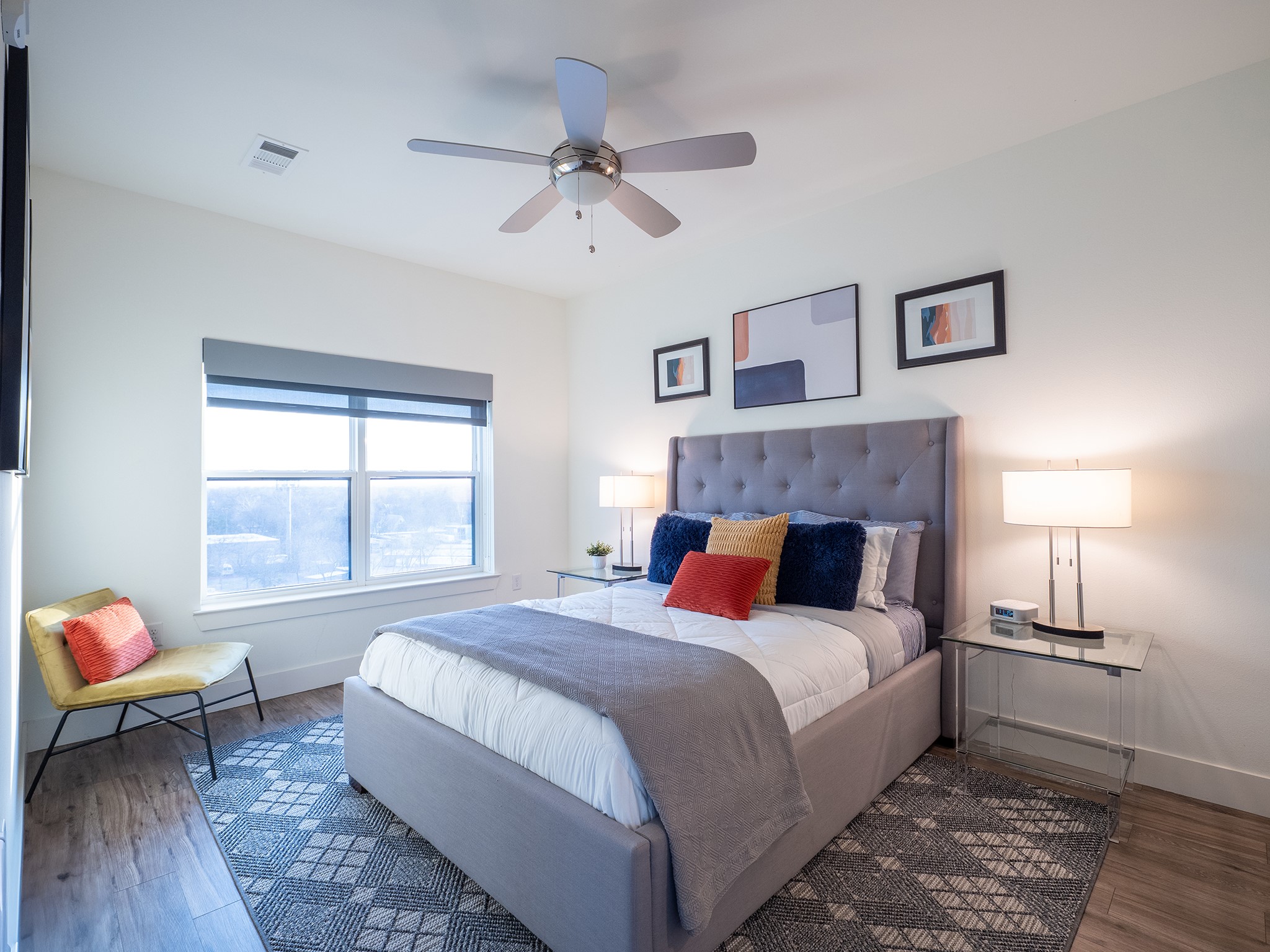 6444 Burnet Road, Unit 509 Austin, TX 78757 - Photo 14 of 32 Bedroom featuring wood finished floors and ceiling fan