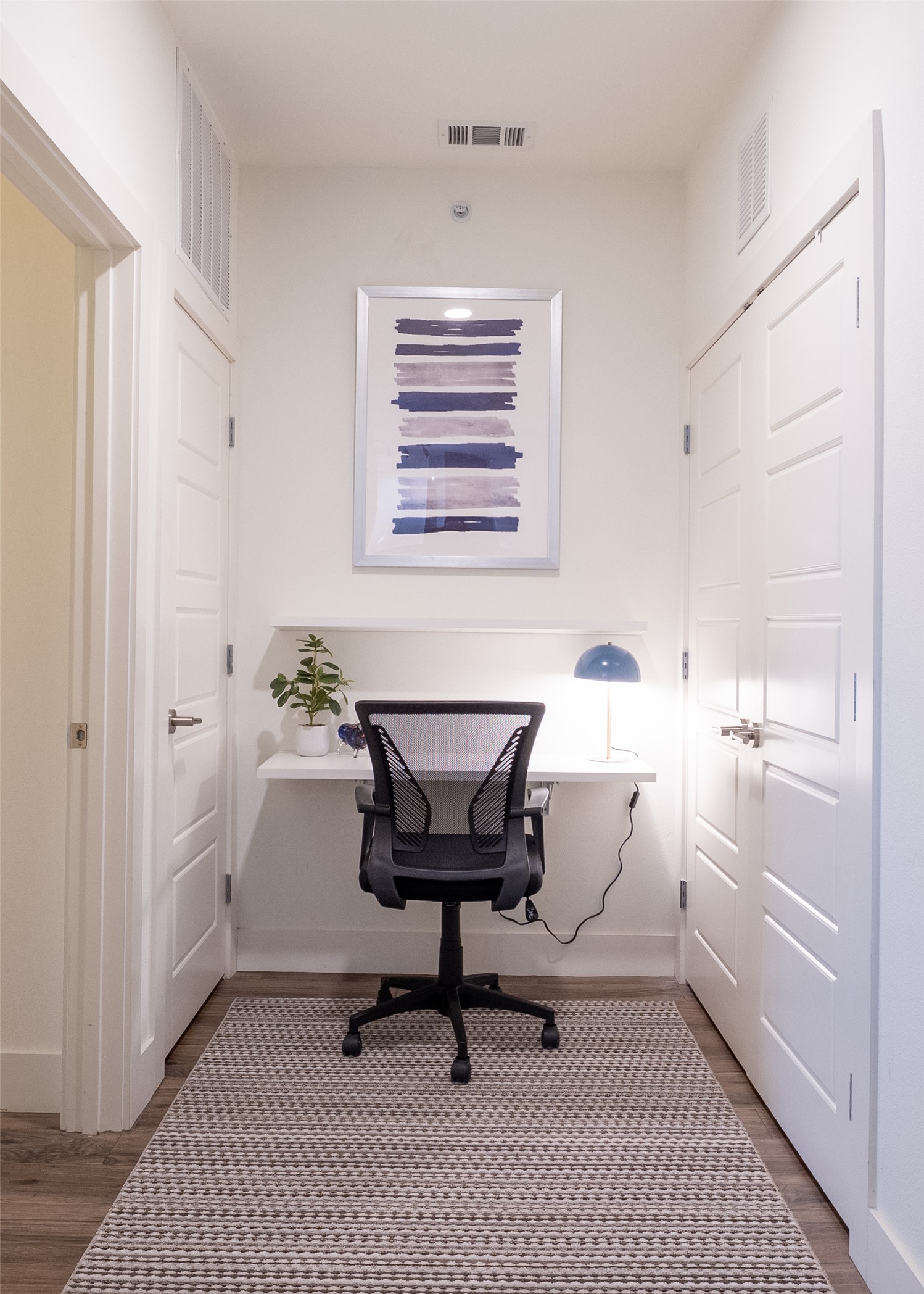6444 Burnet Road, Unit 509 Austin, TX 78757 - Photo 6 of 32 Home office featuring wood finished floors and baseboards