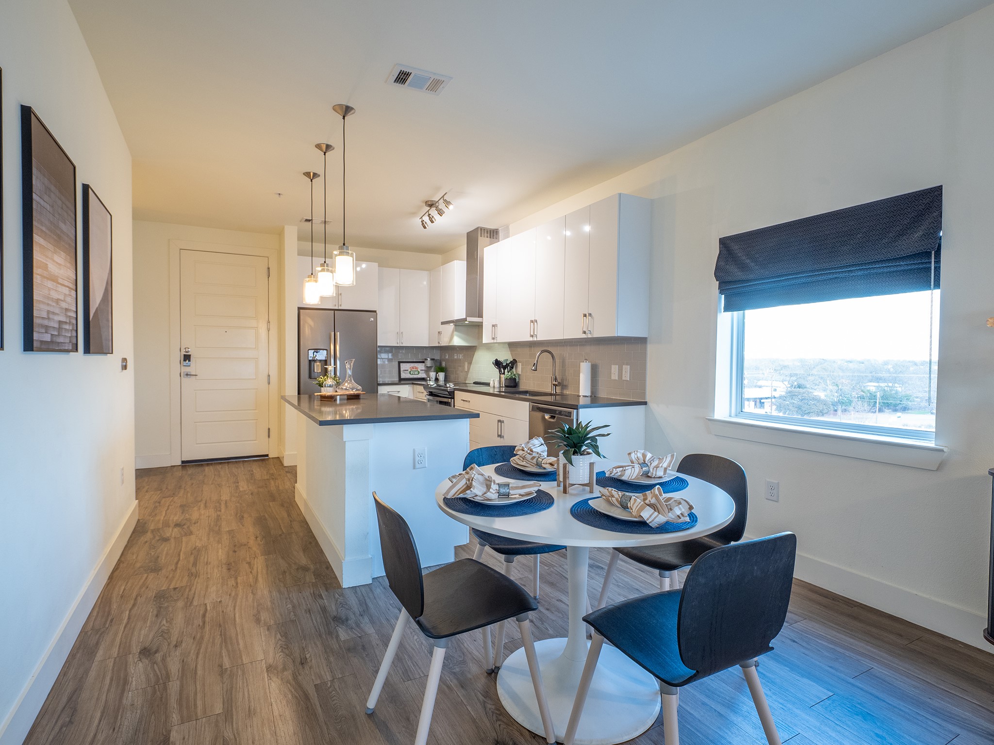 6444 Burnet Road, Unit 509 Austin, TX 78757 - Photo 7 of 32 Dining area with dark wood-style floors