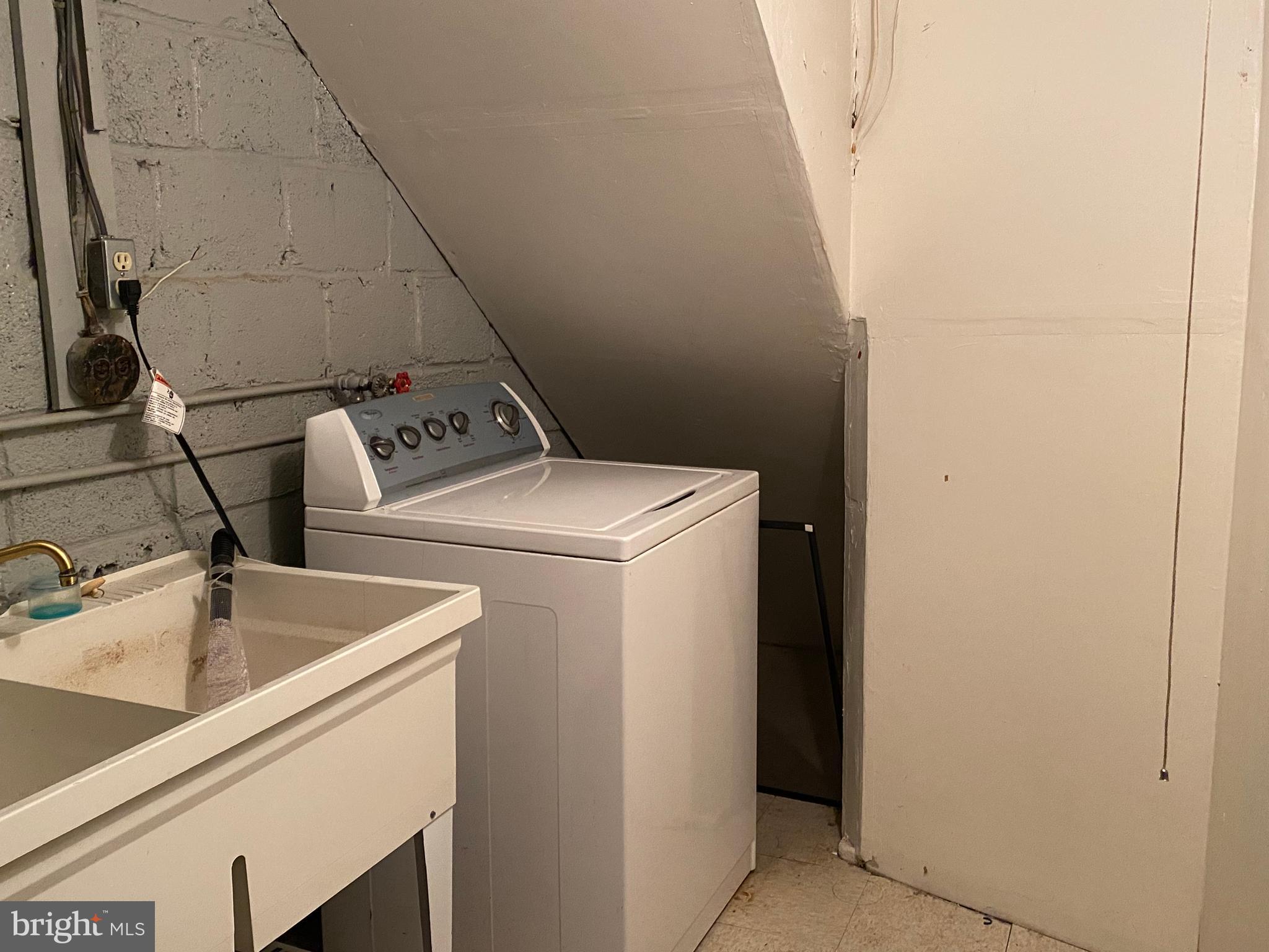 7527 8th Street Northwest Washington, DC 20012 - Photo 17 of 18 a utility room with dryer and washer